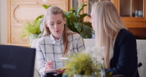 Female Colleagues Discussing Business Strategy - Office Work - Businesswomen Using Digital Tablet