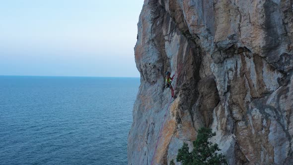 Woman Climber Descending