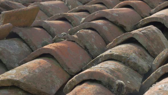 Ancient roof top pieces made of clay 4K 2160p UHD panning  footage - Roof top old tiles made in old 