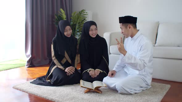 Handsome Muslim man knowledge test about Quran two young women