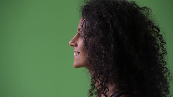 Profile View of Young Happy Beautiful Hispanic Woman Ready for Gym