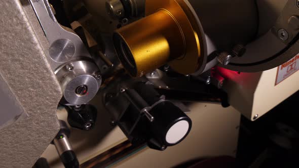 Film Runs Through a 35Mm Projector in a Movie Theater