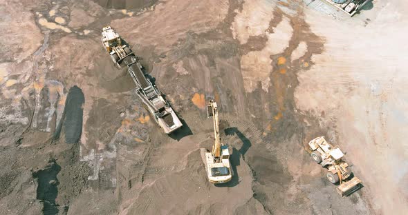 Stone Crusher Machine in Small Size Stones are Conveying Thru the Conveyor Belt Falling Down