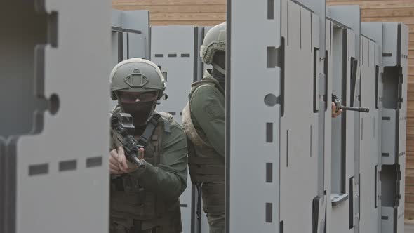 Slow motion of soldiers training in close quarters combat alt