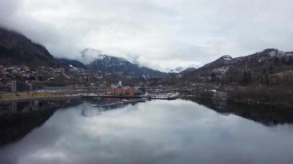 Fly in Arnavaagen lake against Oyrane-torg shopping mall and Arna city centre - Amazingly beautiful