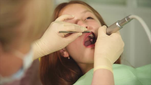 Process of Teeth Cleaning in Dental Cabinet