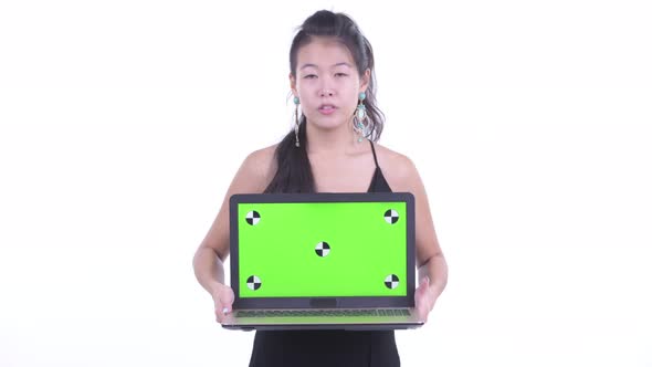 Stressed Asian Woman Showing Laptop and Getting Bad News