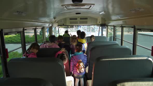 Pupils Leaving School Bus for School