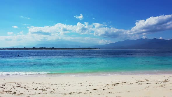 Aerial landscape of idyllic sea view beach vacation by turquoise lagoon with white sandy background 