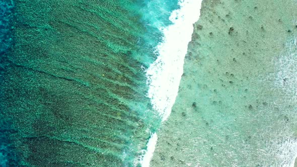 Bermuda islands, Beautiful waves of the crystal clear turquoise sea rolling over the coral reef. aer