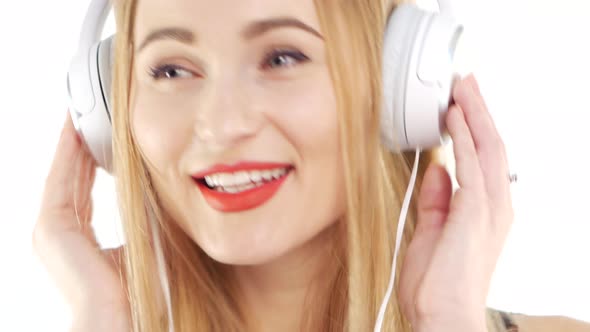 Beauty Woman Listening Music in Headphone, Close Up