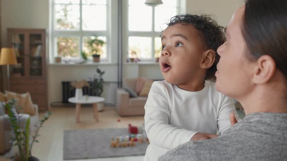 Adorable Toddler Boy and His Mother