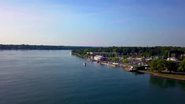 Aerial view of an idyllic small town harbor on a sunny, summer day.