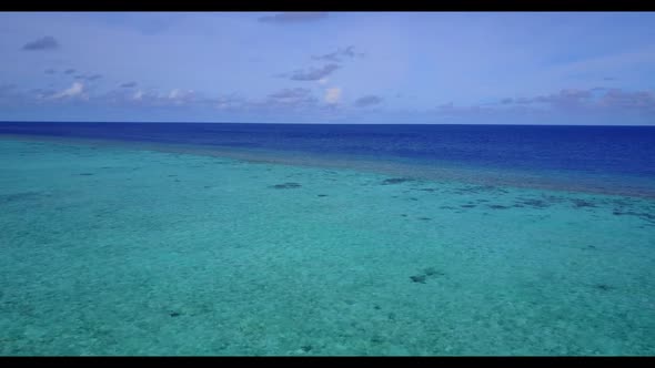 Aerial top down abstract of tranquil shore beach voyage by clear ocean and white sand background of 