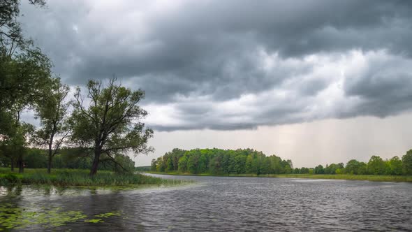 Summer lake and rain clouds