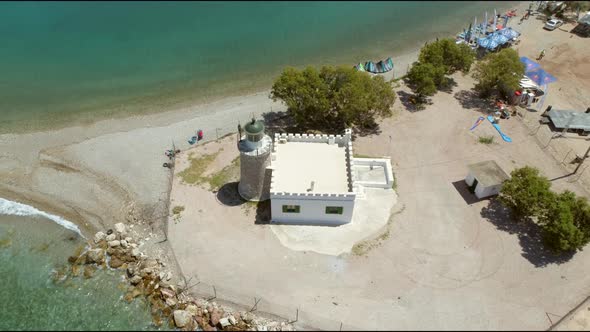 Aerial view of lighthouse in the coast at Gulf of Petras. Greece.