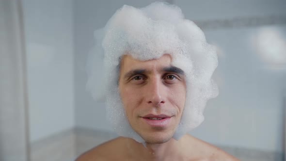 Young Man in a Foam Wig