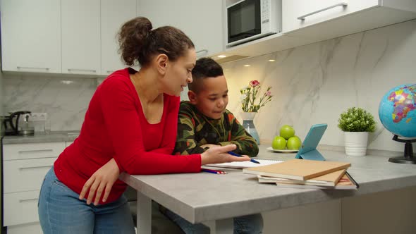 School Boy Can't Understand Schoolwork Elearning with Mother at Home