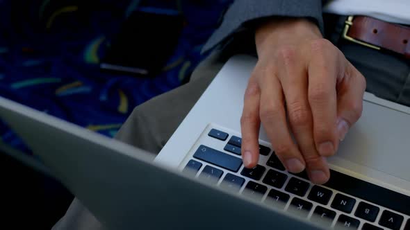 Commuter using laptop while travelling in bus 4k