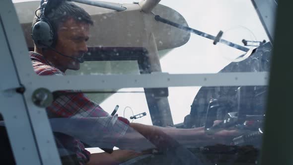 Airman Sitting Airplane Cabin Preparing for Flight Close Up