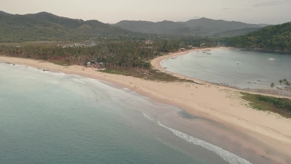 Tropic Resort with Tourists at Sand Beach Aerial