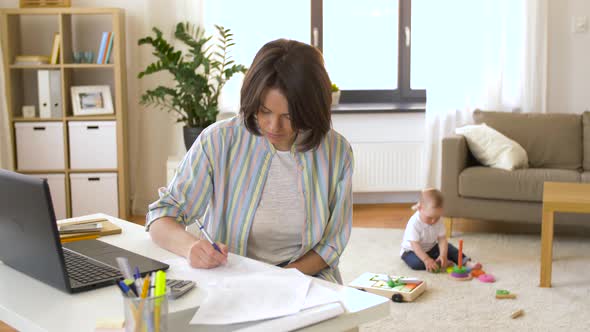 Working Mother with Baby Boy at Home Office 27