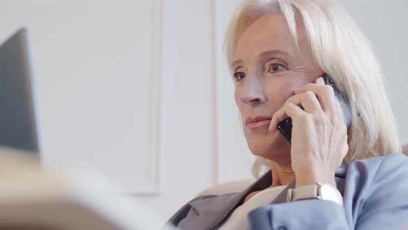 Successful Woman Finishing Mobile Phone Chat