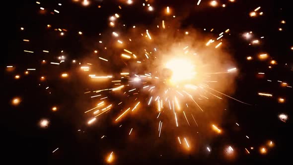 Cracker sparkles spinning isolated on a black background