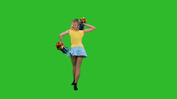 A Cheerleader is Dancing a Jubilant Dance Spinning Gracefully Squatting Doing a Vertical Split