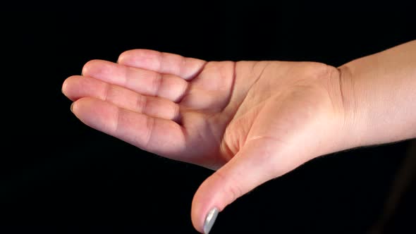 Woman's Hands Press Out One Pill From Blister Pack