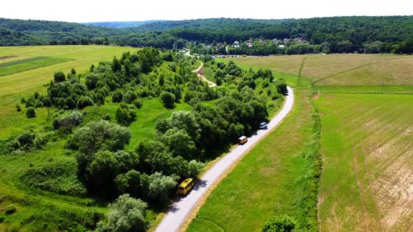 Aerial drone view of a flying over the rural agricultural landscape.