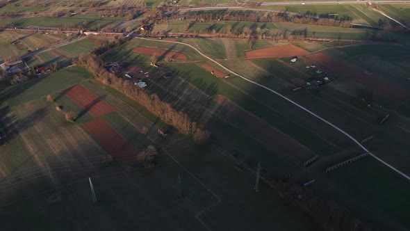 Flying over the countryside on an early spring morning