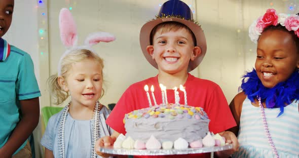 Happy kids at table during birthday party 4k