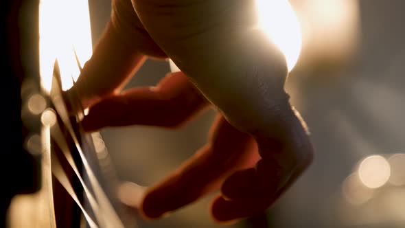 Teen Girl Playing Acoustic Guitar Close Up