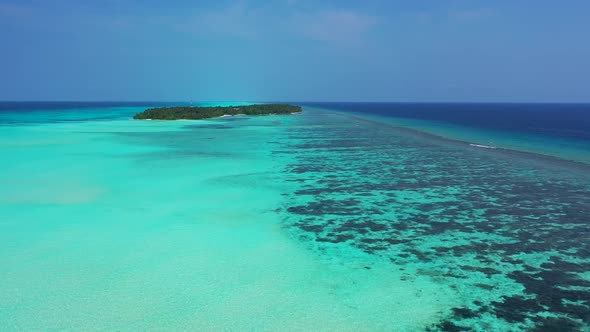 Aerial above nature of idyllic bay beach adventure by clear ocean with white sand background of a pi