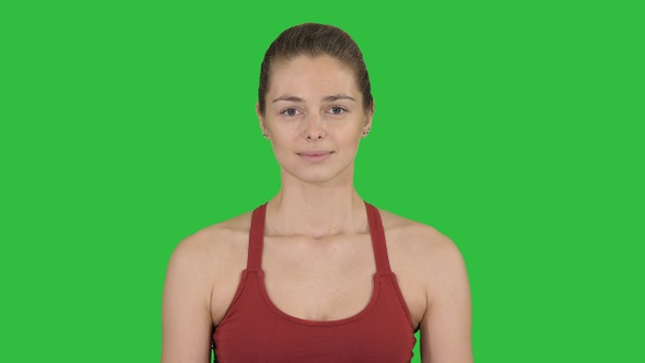 Young Woman Breathing Deeply on A Green Screen, Chroma Key