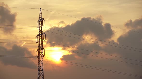 Sunset And Power Transmission Line Tower 2