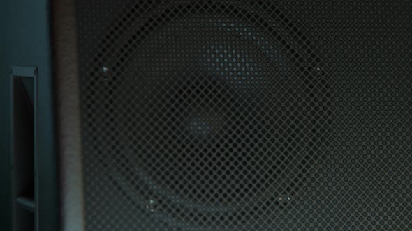 Close-up Of speaker and wire metal cover in amplifier. Music, stage equipment