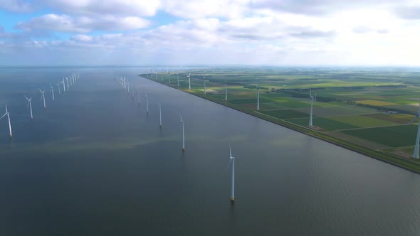 Wind Turbines in the Early Morning Wind Mill Park in the Netherlands