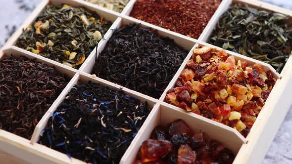 Various Kind of Dry Tea in Wooden Box