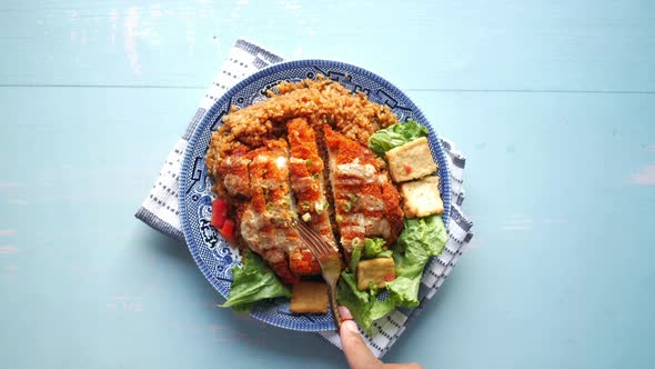 Slice of Chicken Meat Rice and Fresh Vegetable Salad on Table