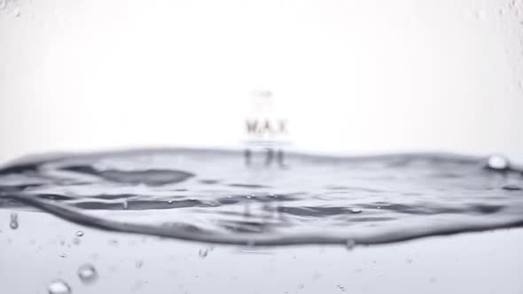 Boiling Water in Glass Kettle on White Background