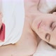 Close Up Video of Young Woman Texting Message with His Cell Phone While Laying on Bed - VideoHive Item for Sale