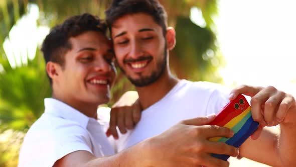 Young Same Sex Couple in Love Outdoors Together Showing All of Feels