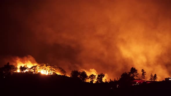 Firemen Battling Against Raging Fire