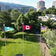 Flags of Penticton, British Columbia and Canada flying on Okanagan Beach, Penticton, BC - VideoHive Item for Sale