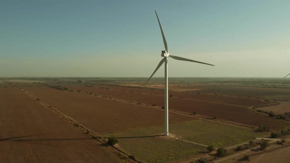 Wind Turbines Moving on Sky Background