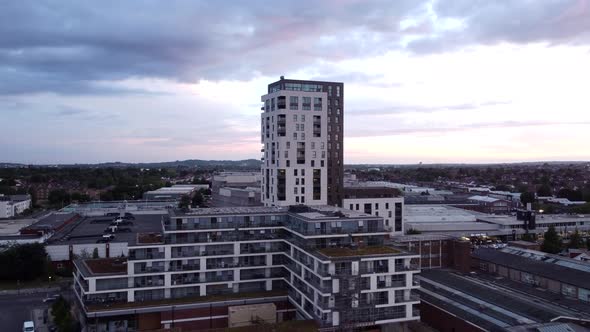 Drone shot of a modern apartment block in an English suburban town