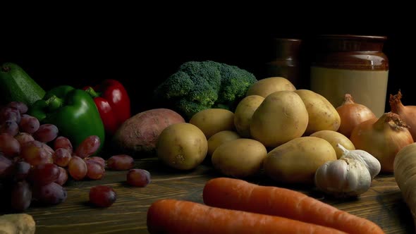 Rustic Food Spread Of Vegetables On Wooden Table