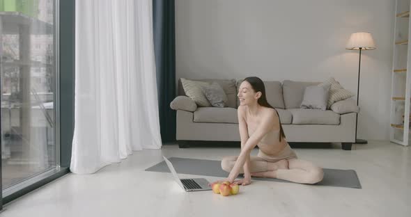 Fir Young Woman Doing Stretching Exercises at Home